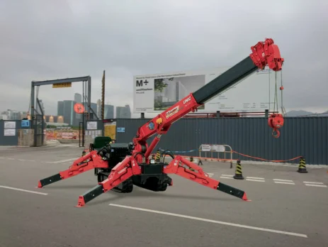 a red crane on a road