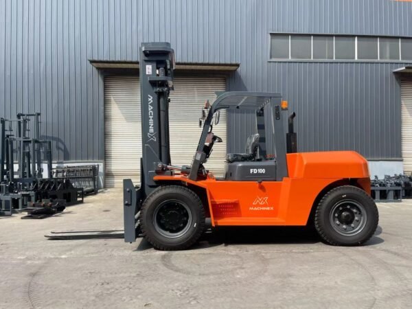 "Machinex FD100 Diesel Forklift parked outdoors, showcasing its robust design and advanced features for heavy-duty industrial lifting tasks.